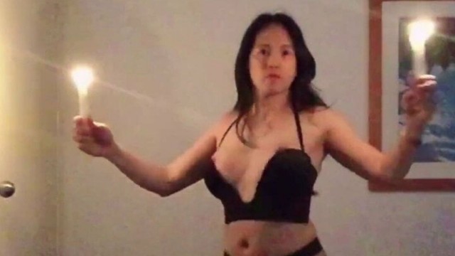 hot shemale doing her candle sexy dance and boobs out